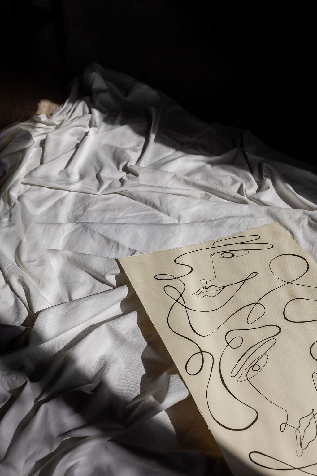 In Sync- Black ink continuous line on watercolour deckle edge 300gsm paper..