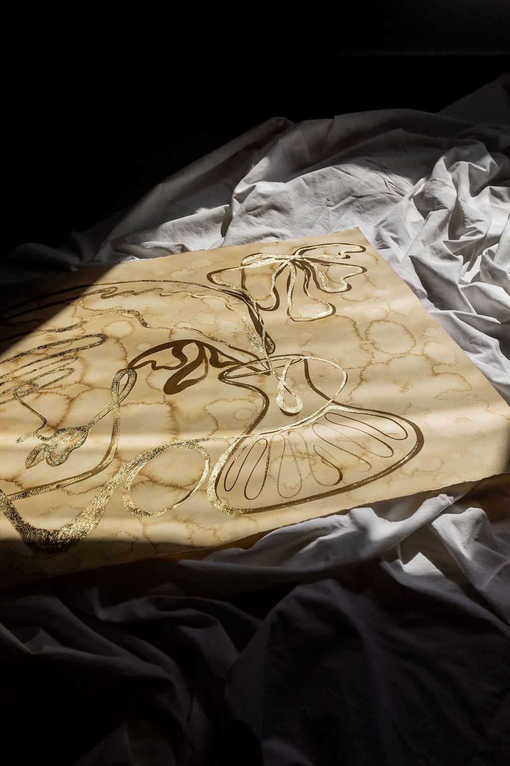 She buys her own flowers - Gold leaf + Sepia ink continuous line on water-dyed paper.