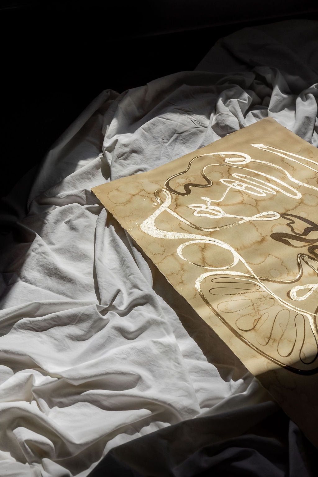 She buys her own flowers - Gold leaf + Sepia ink continuous line on water-dyed paper.