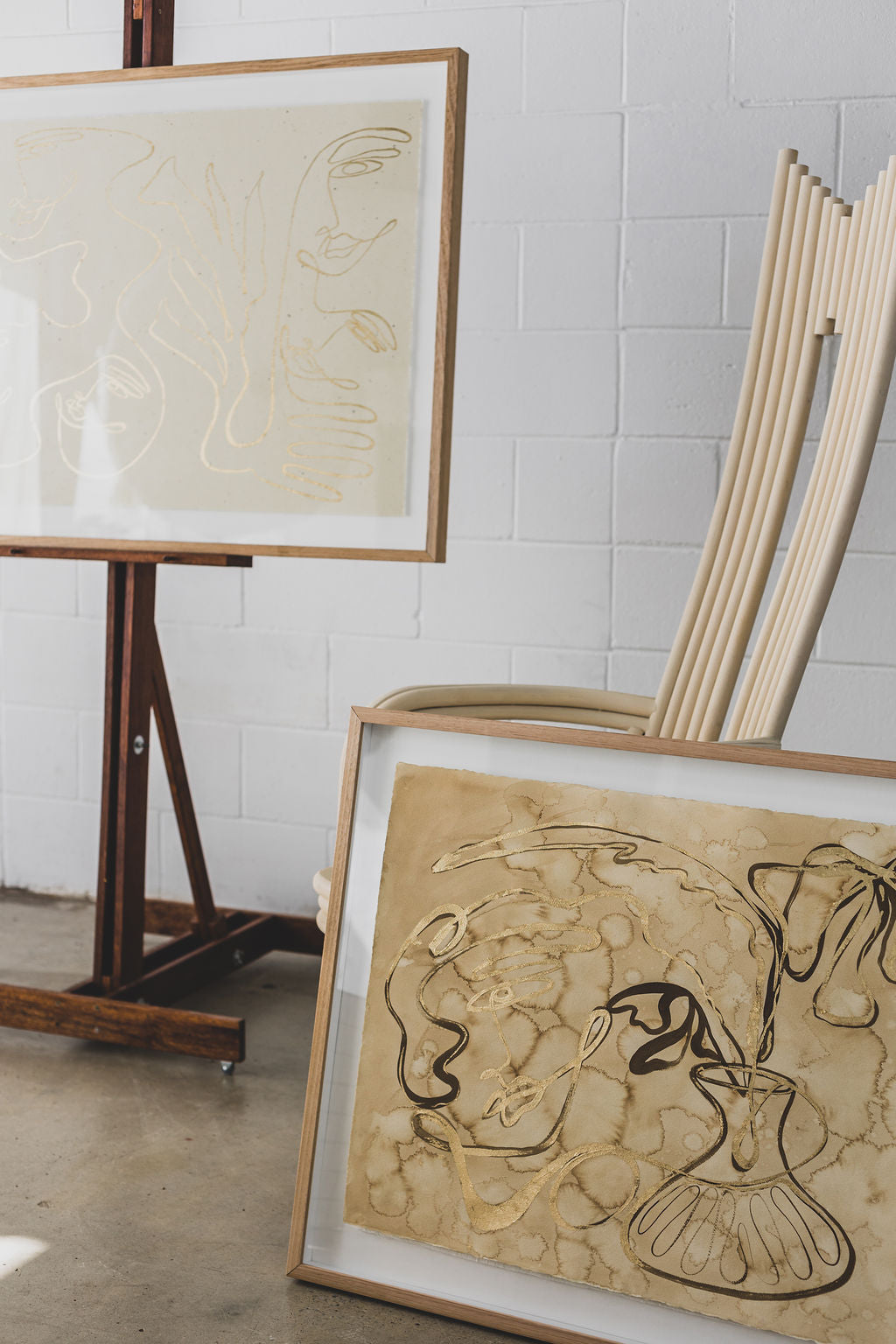 She buys her own flowers - Gold leaf + Sepia ink continuous line on water-dyed paper.